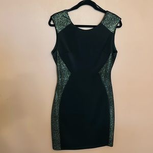 Women’s party dress. Black mini with gold accent